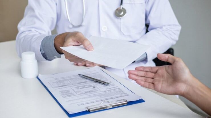 doctor prescribes treatment for parasites